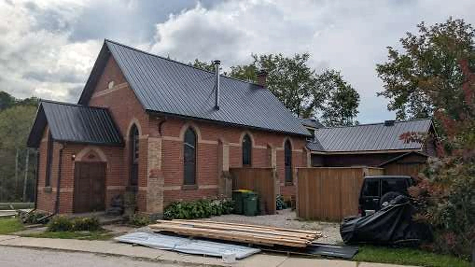 Metal roof on a brick building