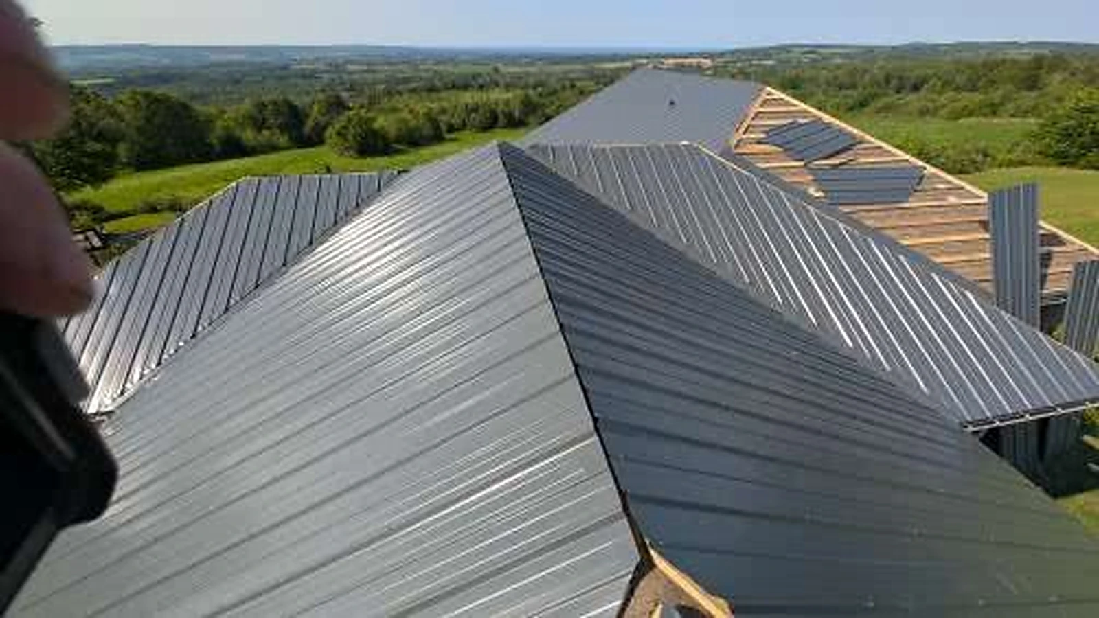 Metal roof installation in progress